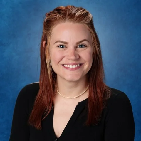 Mrs. Elizabeth Holland